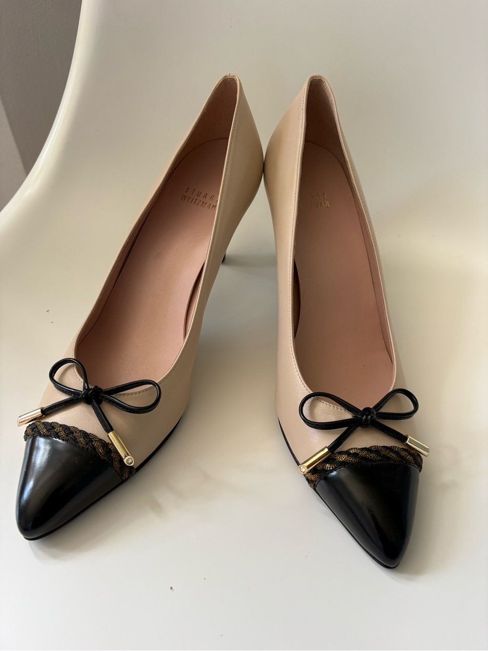 Stuart Weitzman Beige and Black Pointed Toe Bow Pumps
